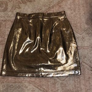 Gold sparkly mini skirt